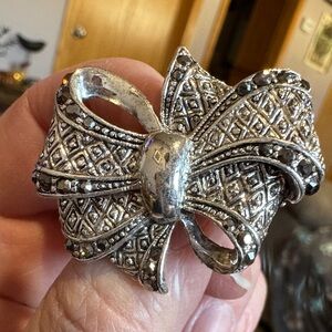 Elegant Silver Bow brooch
